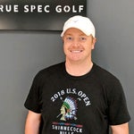 Former collegiate football player and mid-handicapper Graham Fisher poses at his True Spec club fitting.