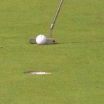 Tiger Woods prepares to hit his putt on the 11th hole Thursday during the 2019 Farmers Insurance Open.