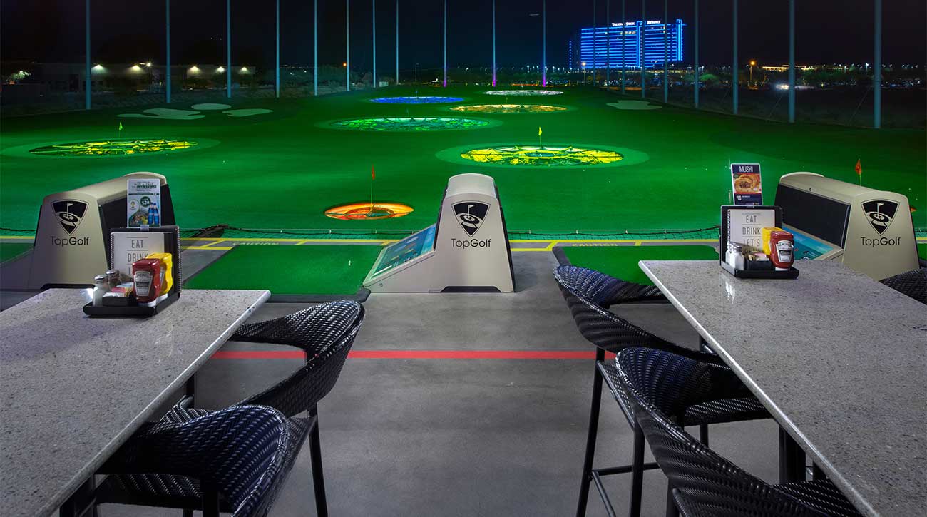 A view of the hitting bays at Topgolf.