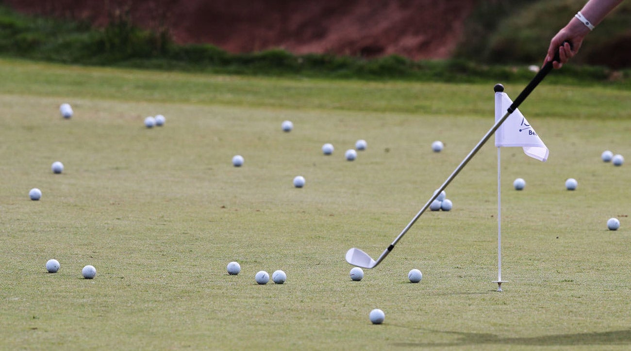 Don't bother touching those little flags on the practice green.
