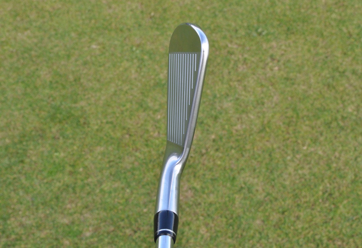 Titleist CP-02 iron at address.