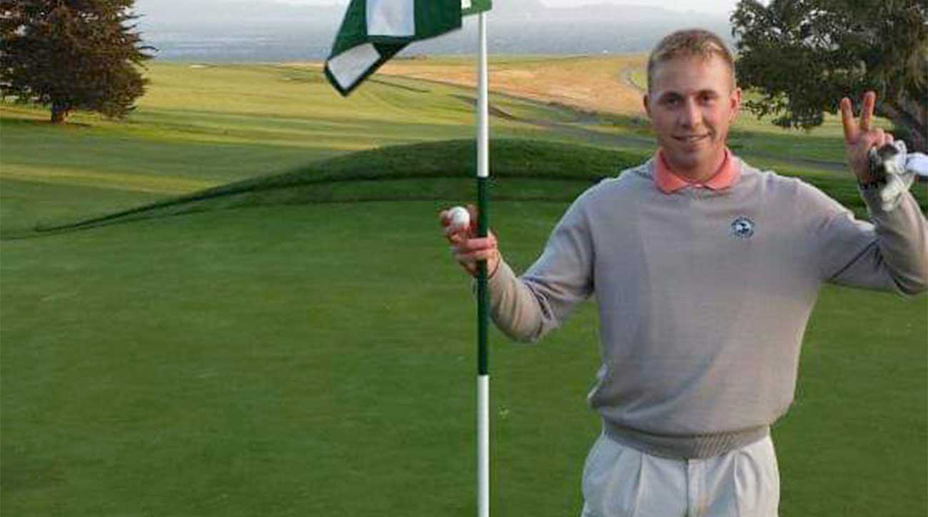 Mike Duncan poses for a photo after his miraculous shot.