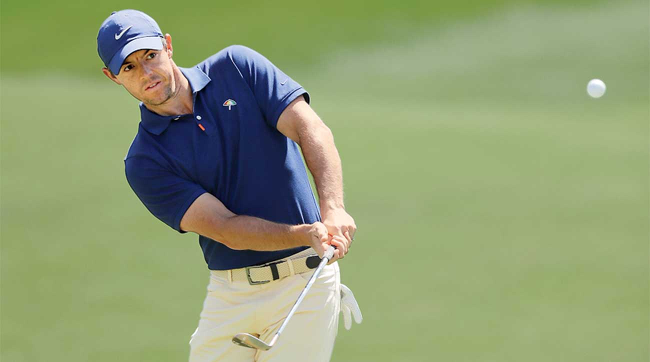 Rory McIlroy chips onto the green.