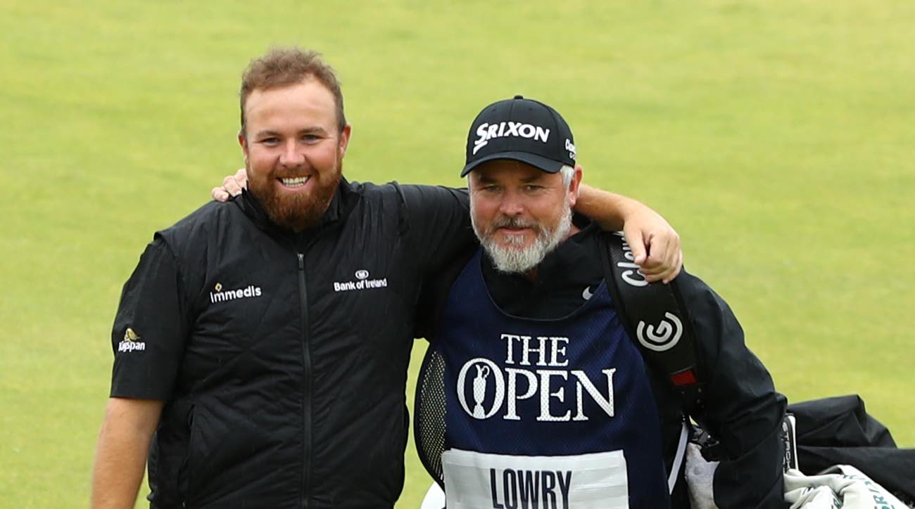 PORTRUSH, NORTHERN IRELAND - JULY 21: Open Champion Shane Lowry of Ireland celebrates with caddie Bo Martin on the 18th green during the final round of the 148th Open Championship held on the Dunluce Links at Royal Portrush Golf Club on July 21, 2019 in Portrush, United Kingdom. (Photo by Francois Nel/Getty Images)