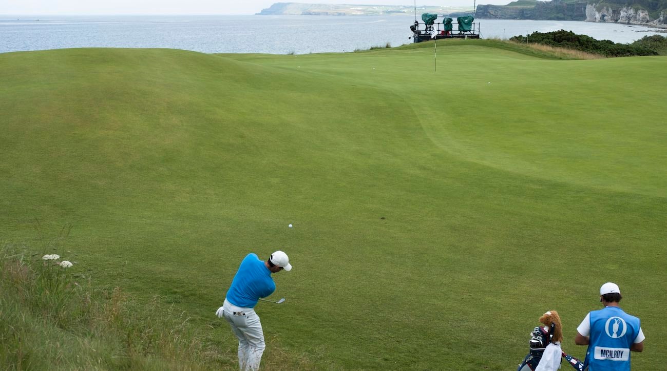 Rory McIlroy chips onto the 5th green during a practice round of the Open Championship at Royal Portrush.