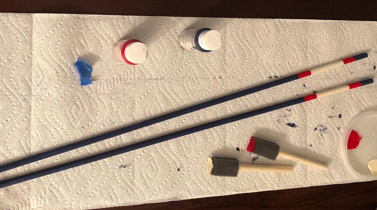 Painting stripes on your alignment sticks is easy, just make sure you use your painters tape accordingly.