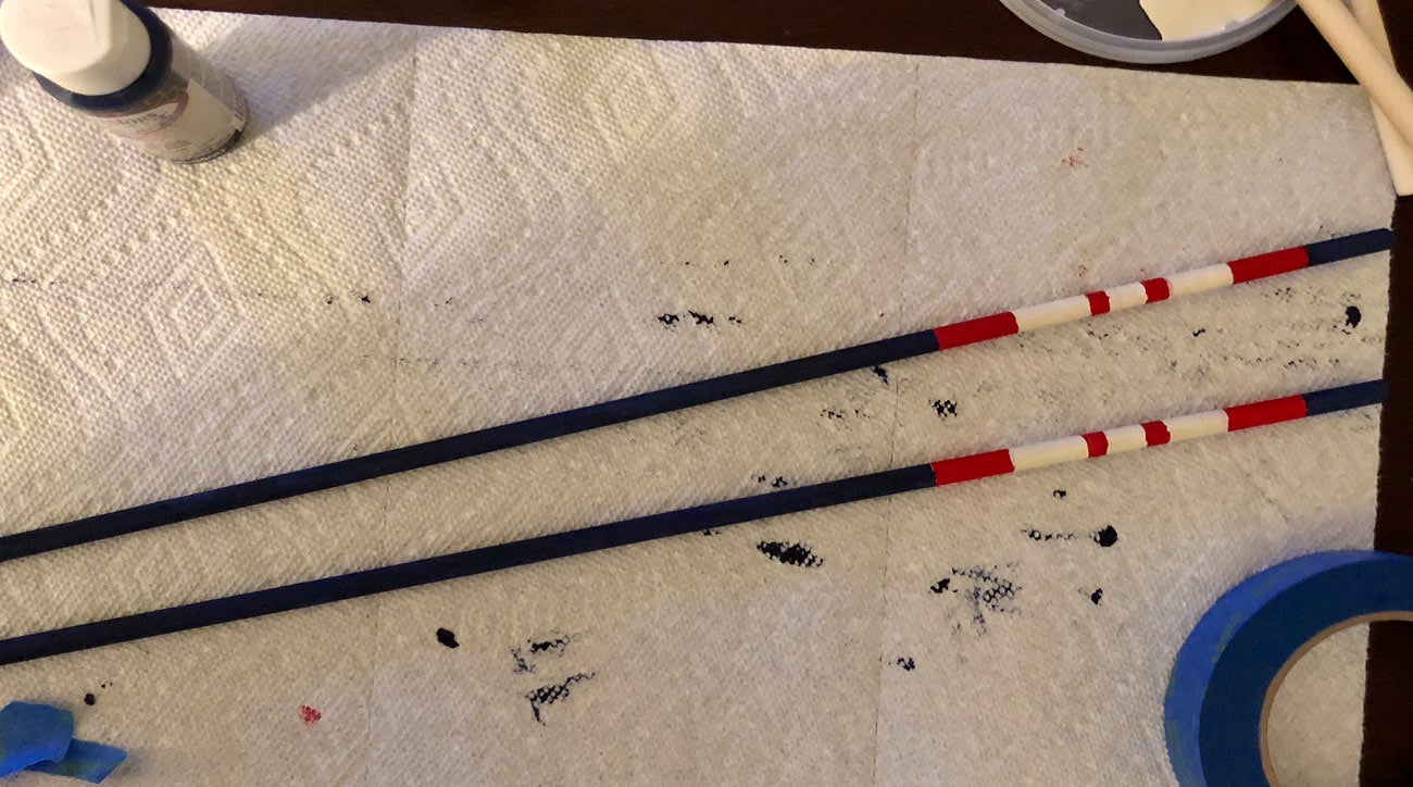 Once you've finished painting your alignment sticks, let them dry completely before you weatherproof them.