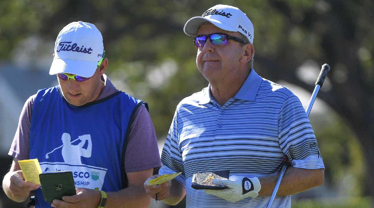 Mayfair with his caddie, Jeff Johnson, in the second round of Invesco QQQ Championship.