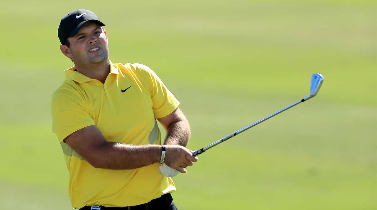 Patrick Reed watches an approach shot during the third round of the Hero World Challenge. Reed finished two shots off the lead due to a costly rules infraction.