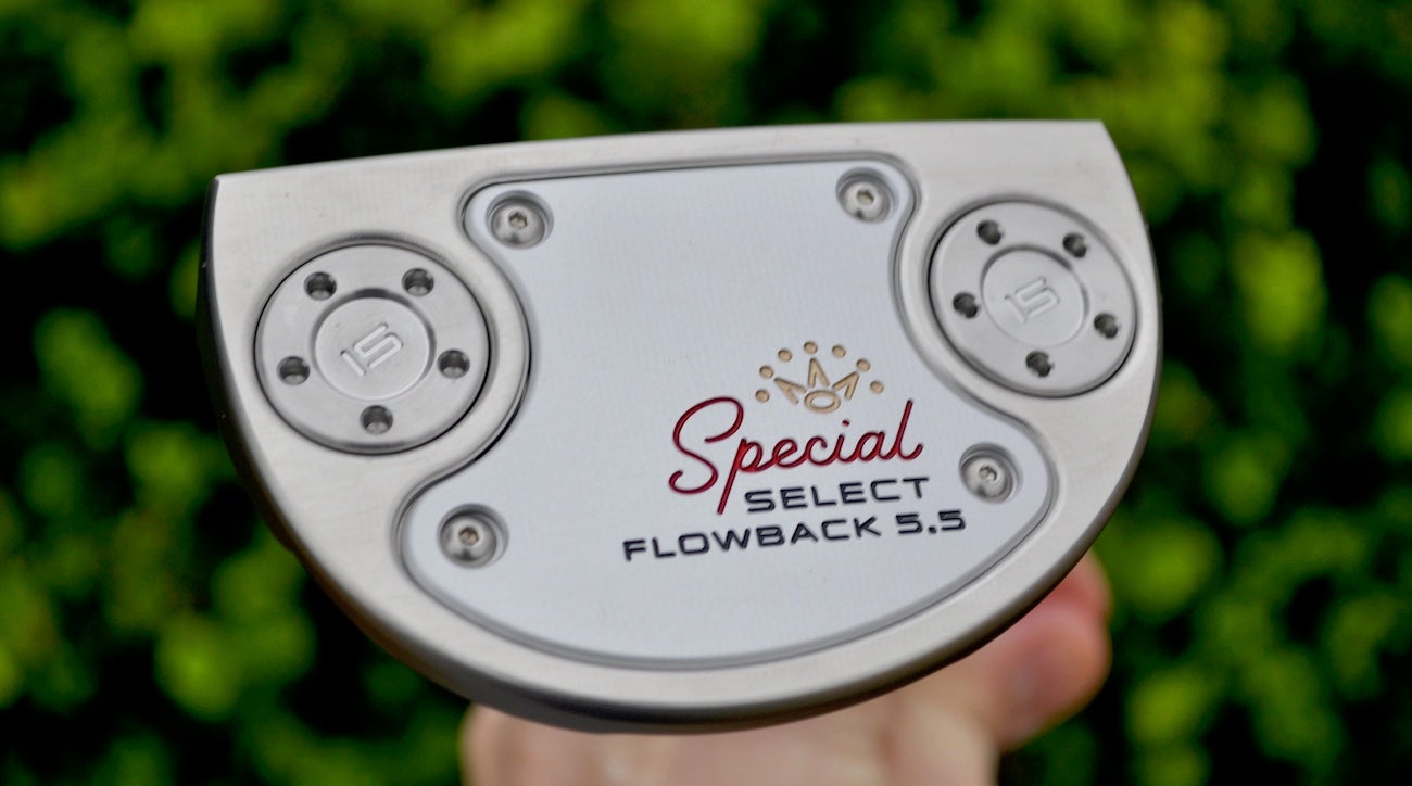 Stainless steel heel-toe weights are positioned in the sole of the mallets.
