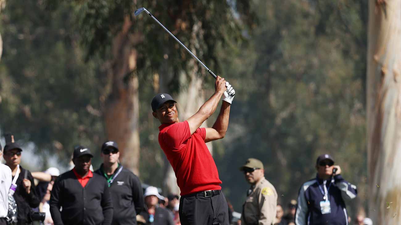 Tiger Woods hits a shot during Sunday's final round of the Genesis Invitational.