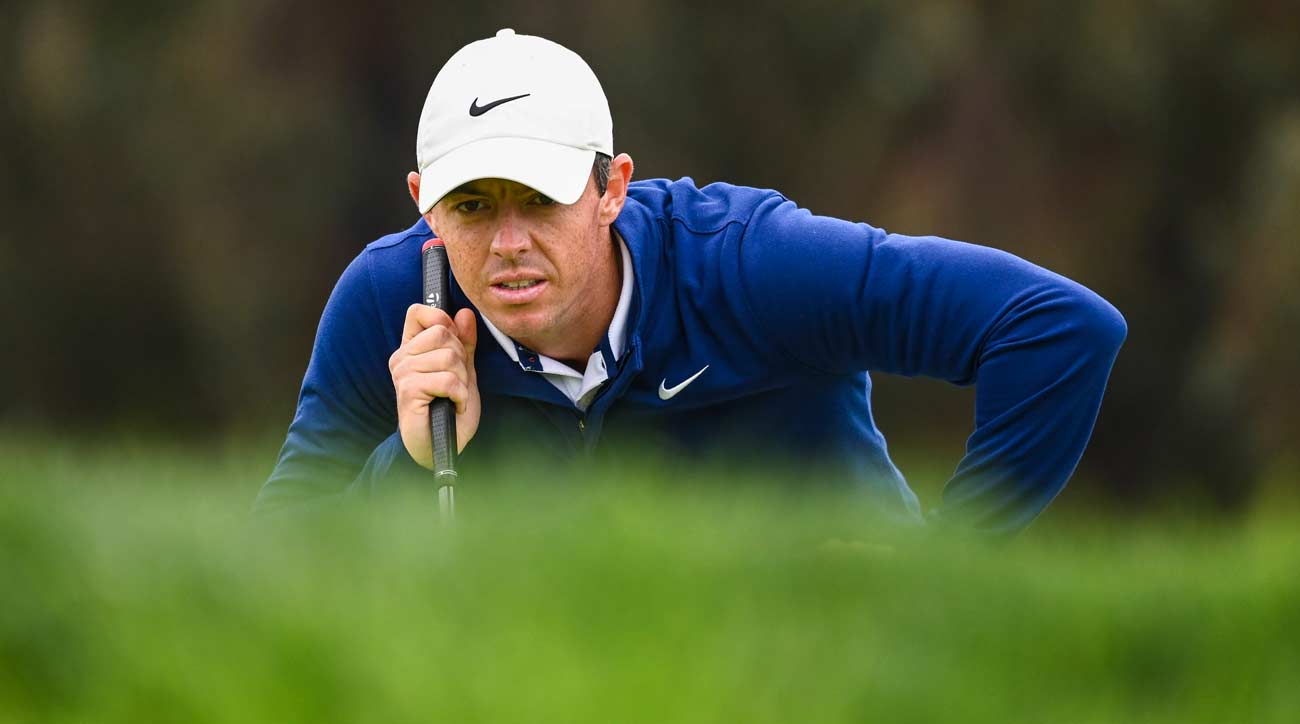 Rory McIlroy reads a putt at the Farmers Insurance Open.