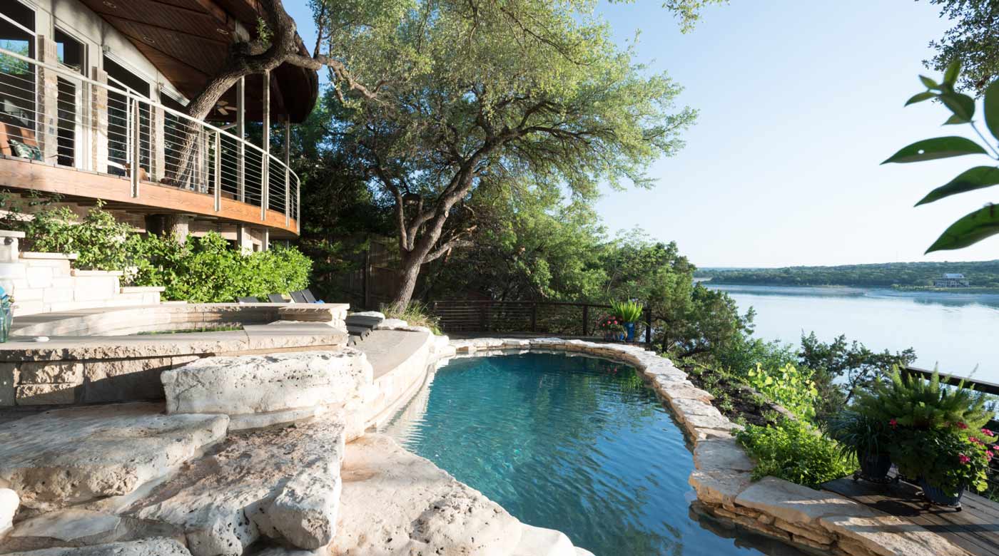 Backyard pool overlooking Lake Travis.