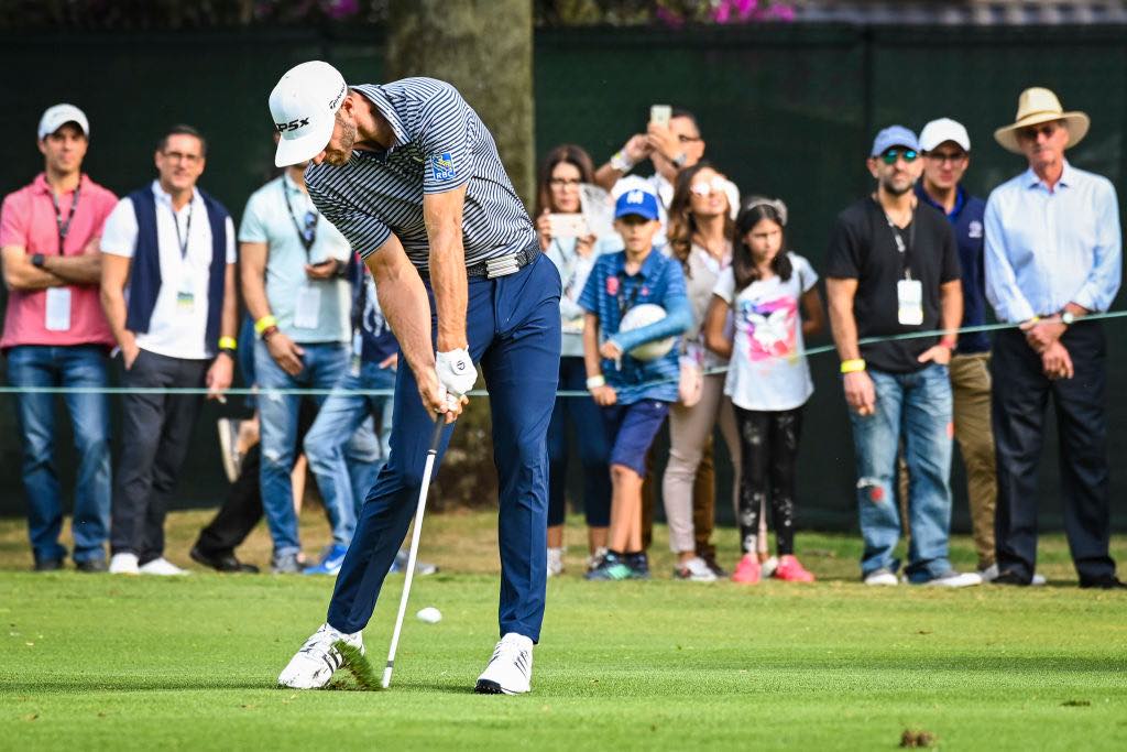 MEXICO CITY, MEX - FEBRUARY 24: Dustin Johnson makes impact as he plays a shot on the 16th hole fairway during the final round of the World Golf Championships - Mexico Championship at Club de Golf Chapultepec on February 24, 2019 in Mexico City, Mexico. (Photo by Keyur Khamar/PGA TOUR)