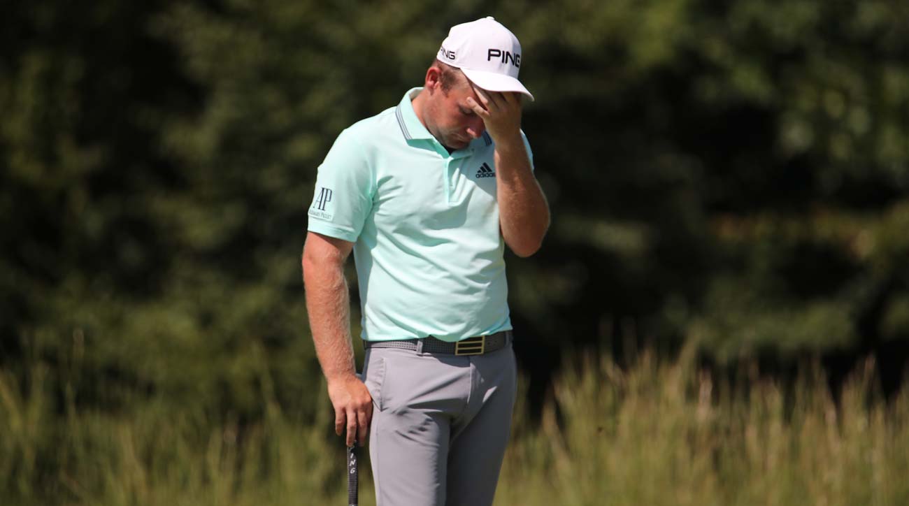 exasperated golfer on green