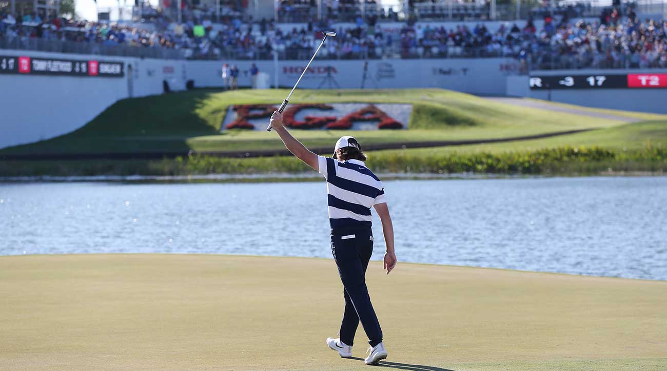 Tommy Fleetwood raises putter