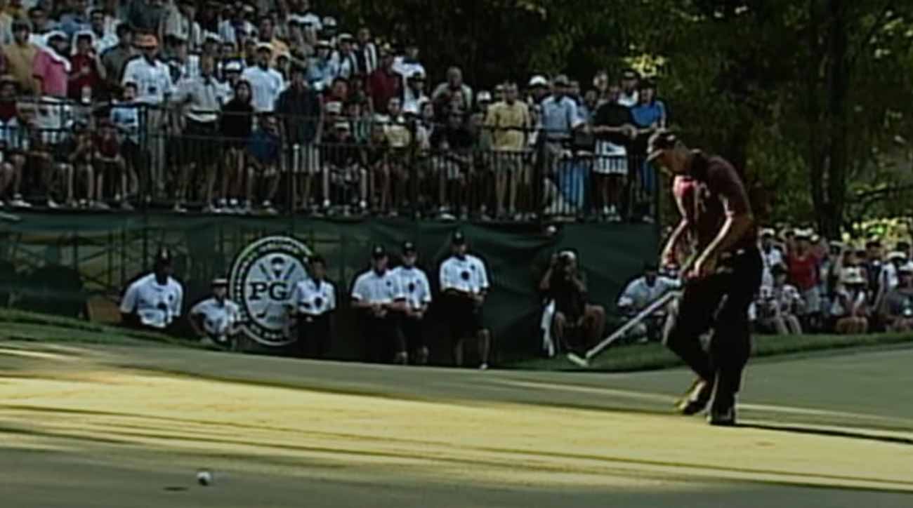 Tiger Woods chasing putt
