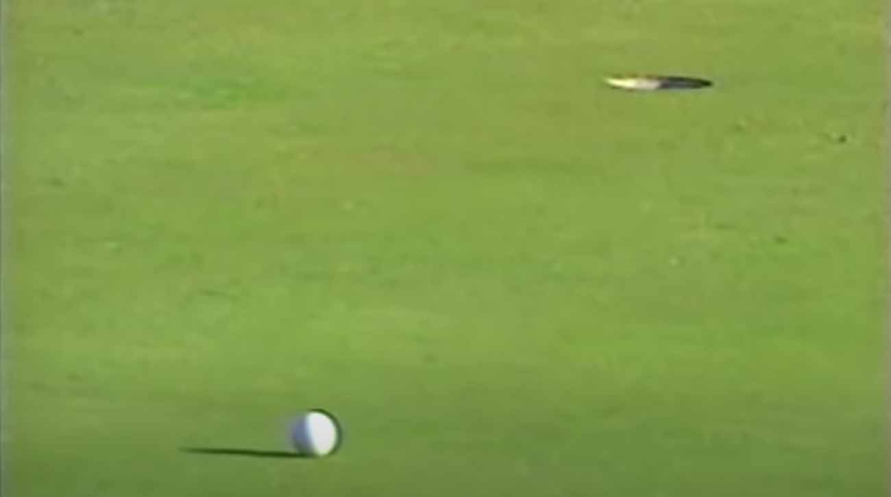 Woods' ball still had a ways to go when Johnny Miller called, 