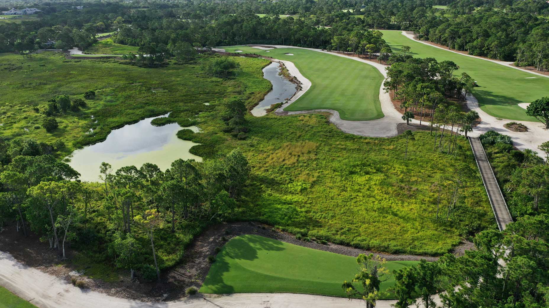 An aerial drone view of the 14th hole at Medalist Golf Club.