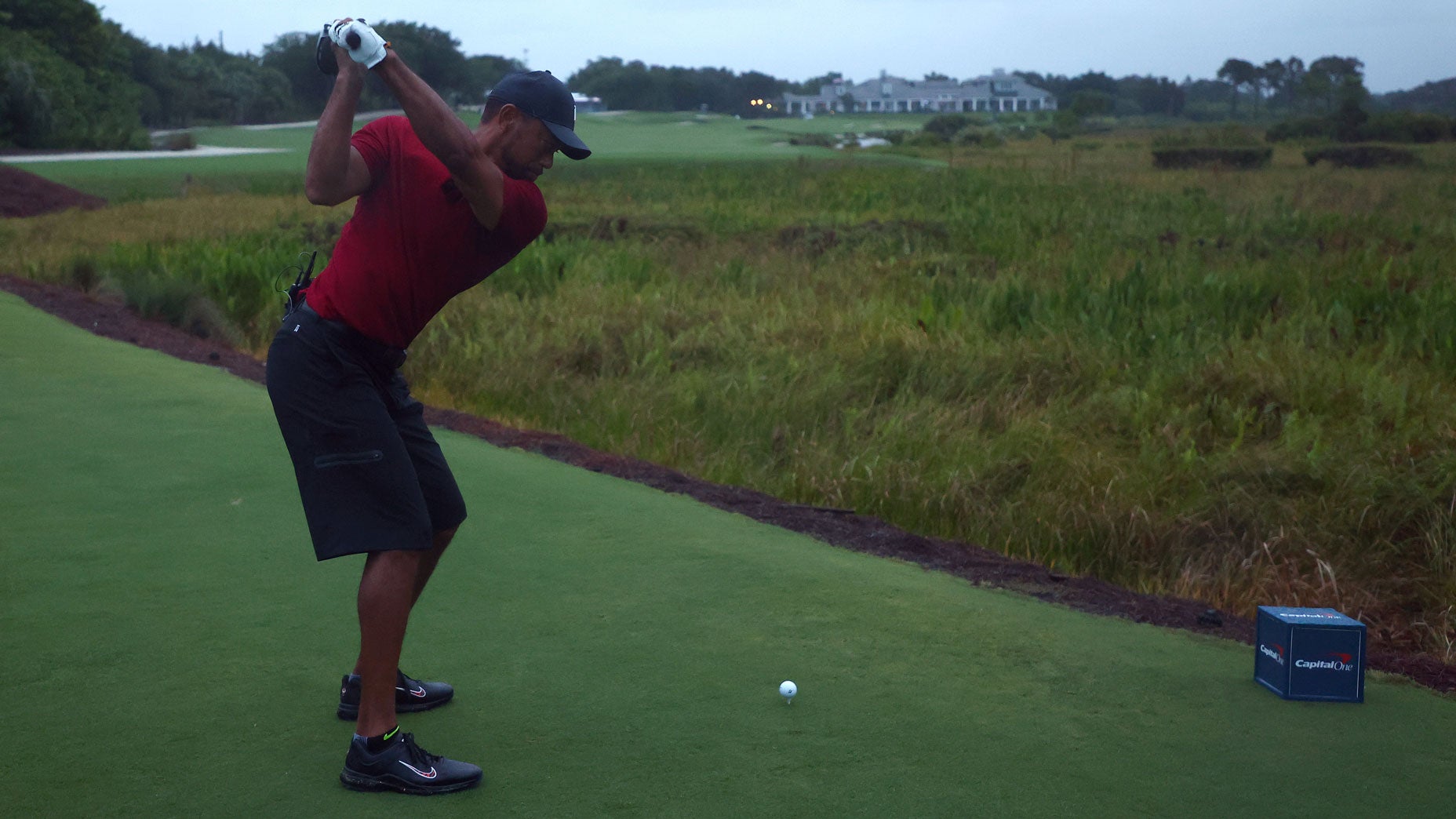 Tiger Woods hits his tee shot on the 18th hole at Medalist Golf Club.
