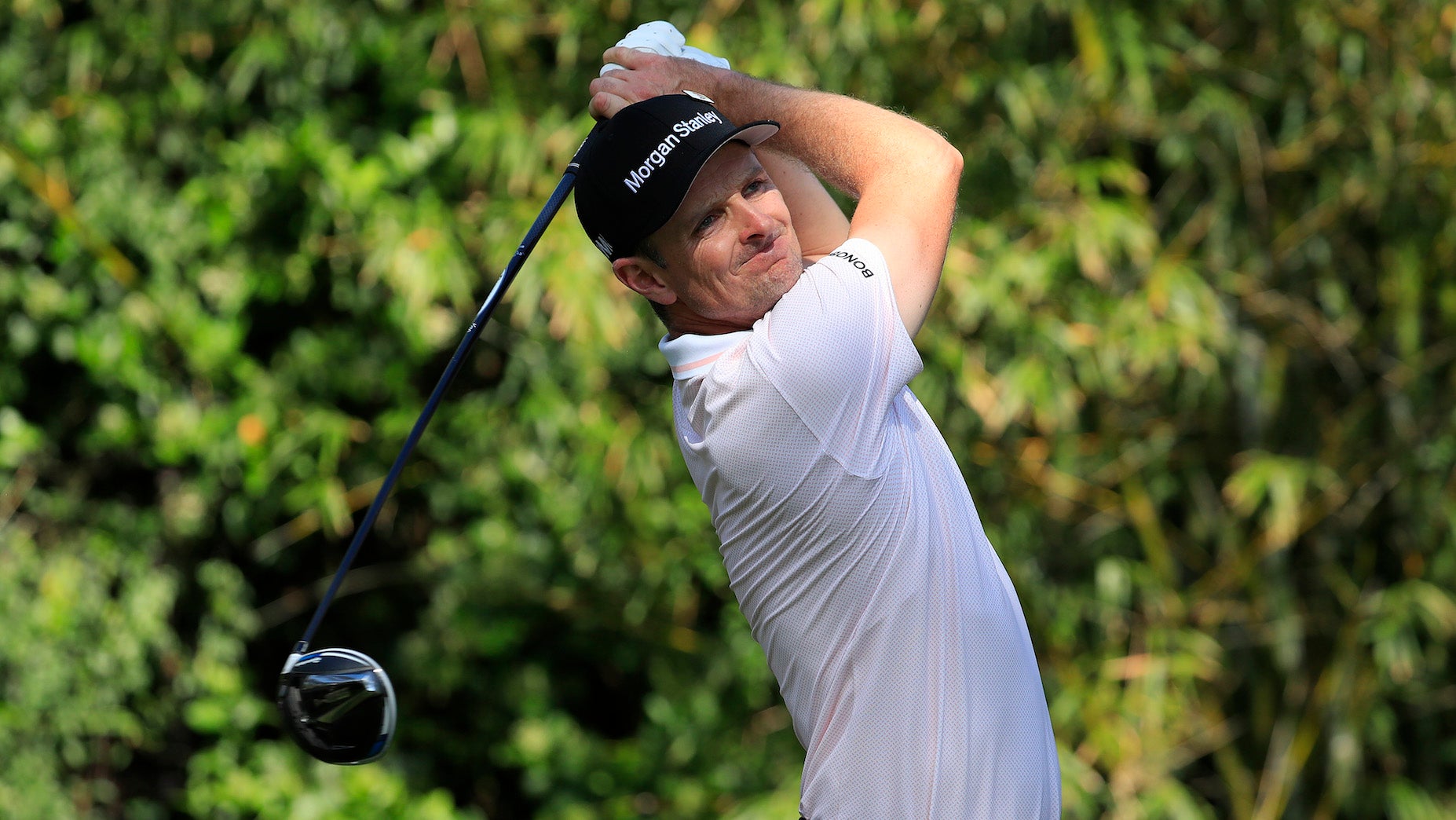 Justin Rose hits a tee shot earlier this season.