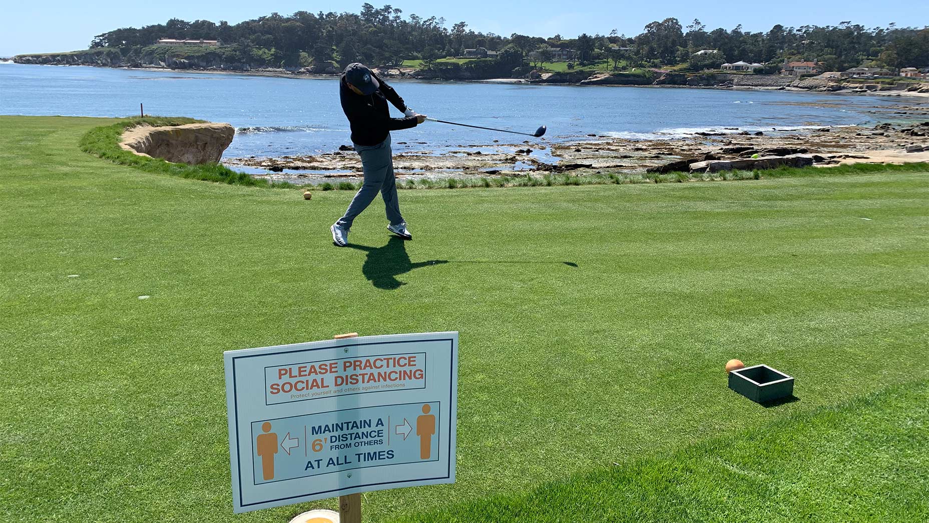 GOLF senior writer Alan Shipnuck tees off during a round at Pebble Beach on Monday, the first day it re-opened.