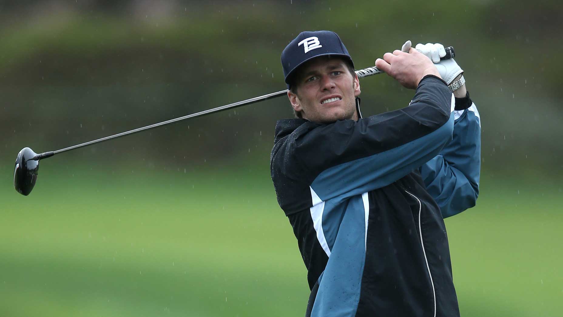 Tom Brady swings his driver at Pebble Beach.