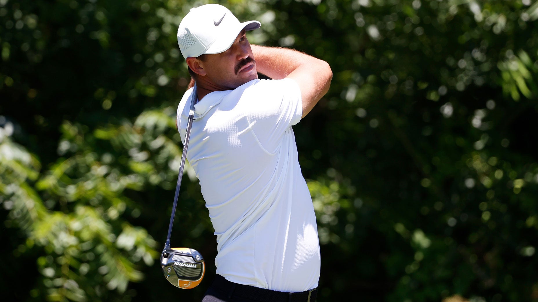 Brooks Koepka hits a tee shot during the Charles Schwab Challenge.