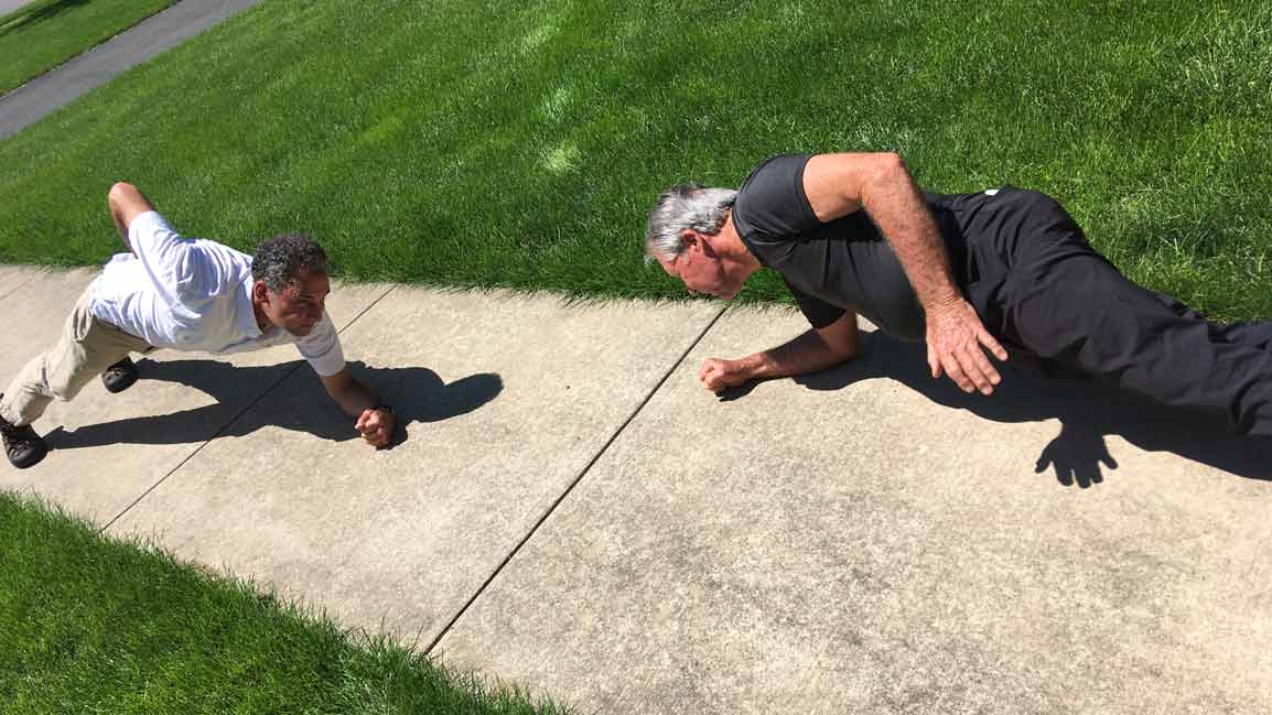michael bamberger and gary player workout together