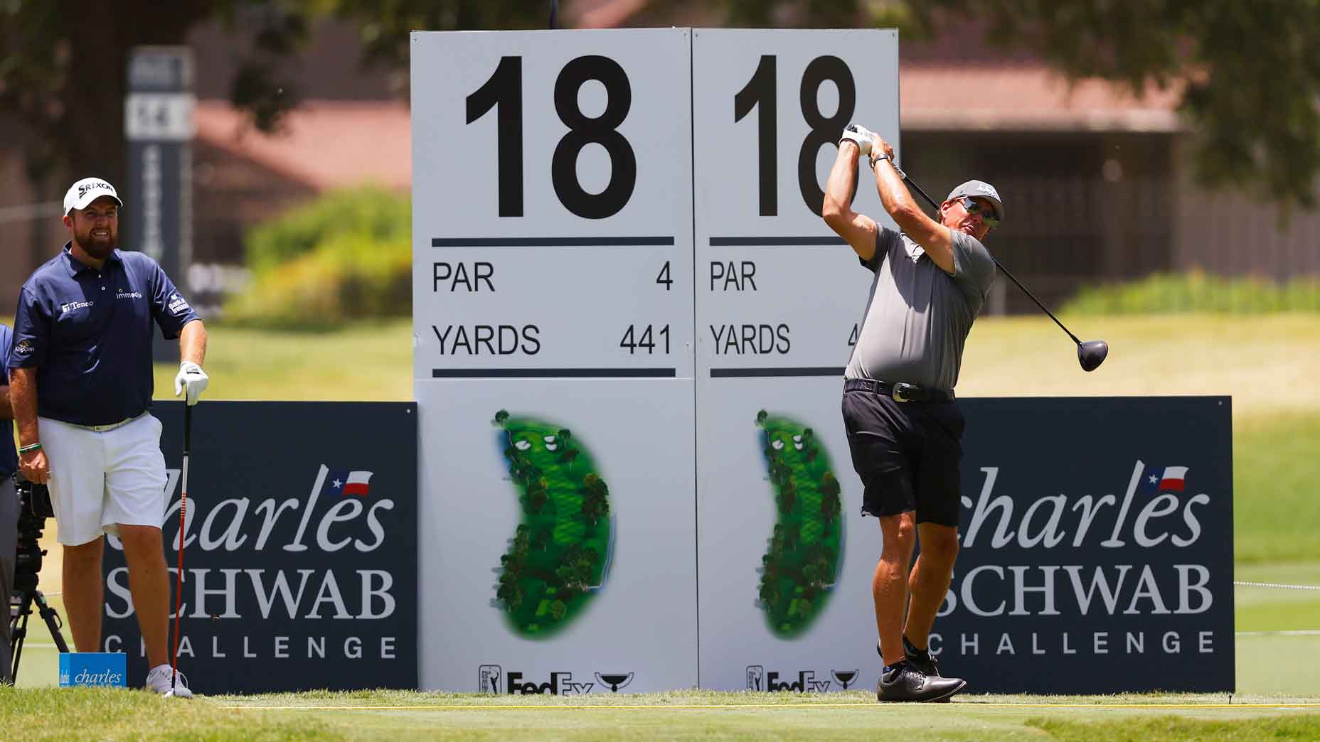 Pro golfer Phil Mickelson tees off