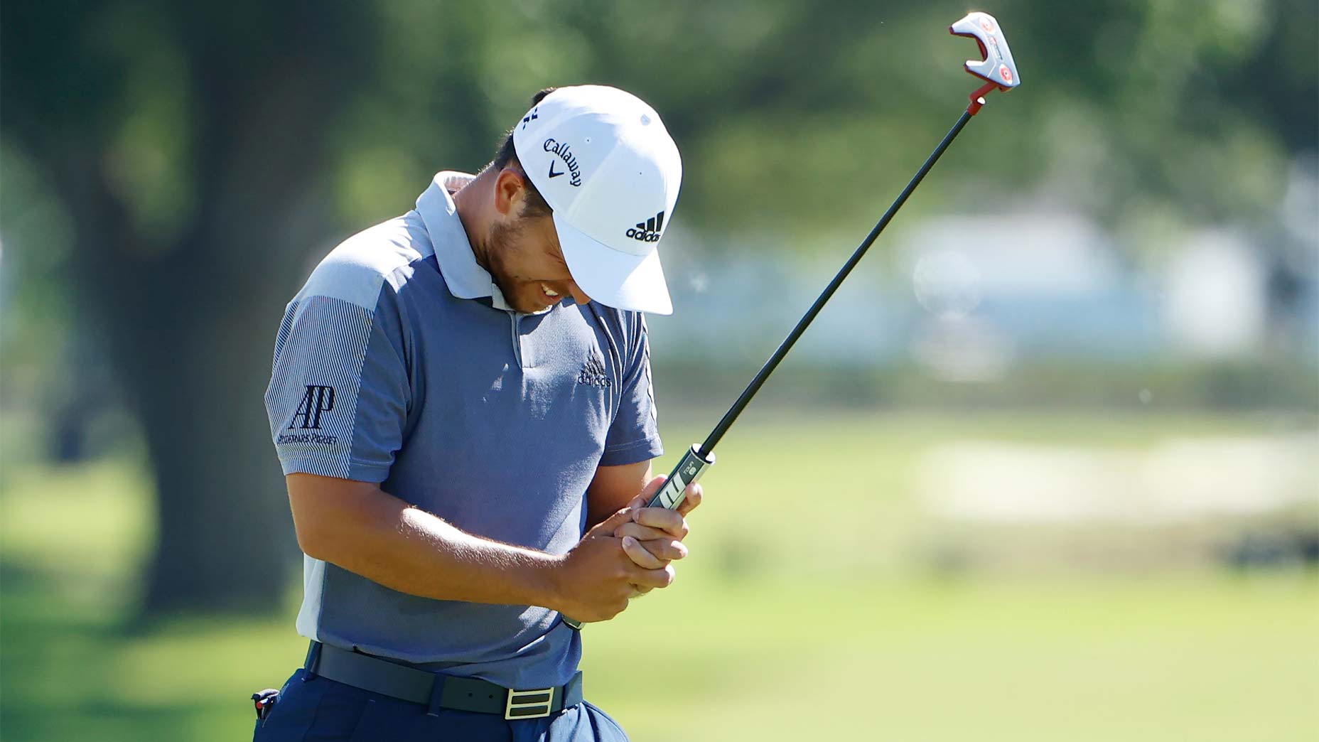 Xander Schauffele reacts after missing a birdie putt on the 72nd hole at Colonial.