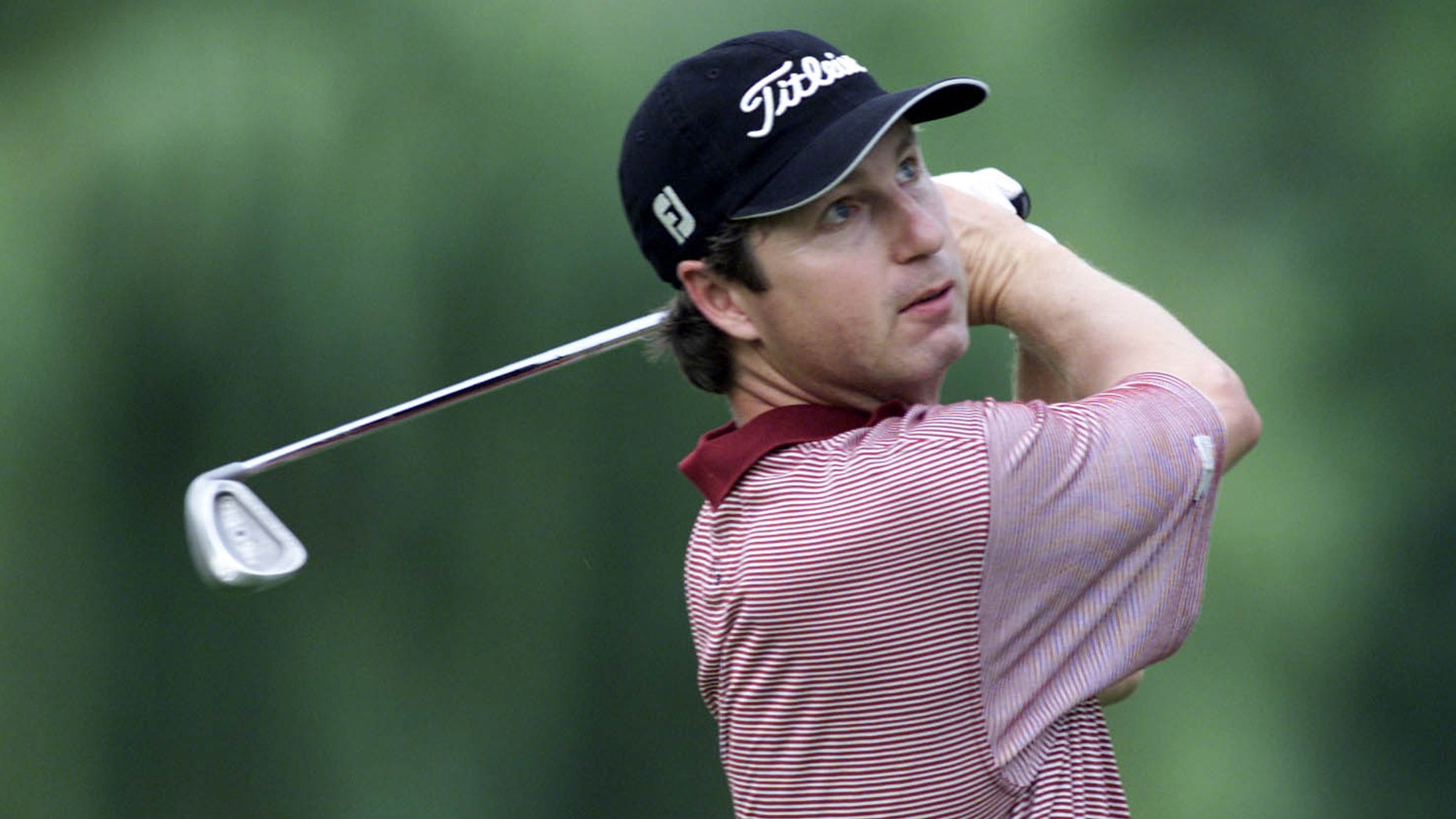 Brandel Chamblee watches a shot at a tournament.