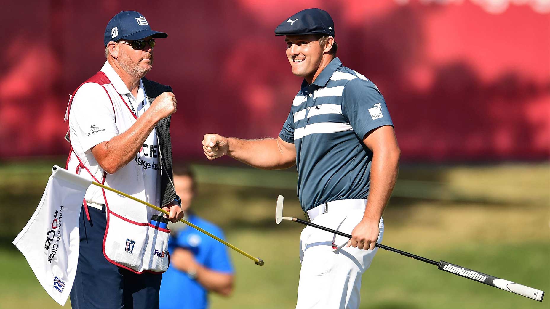 Bryson dechambeau fist pumps caddie rocket mortgage