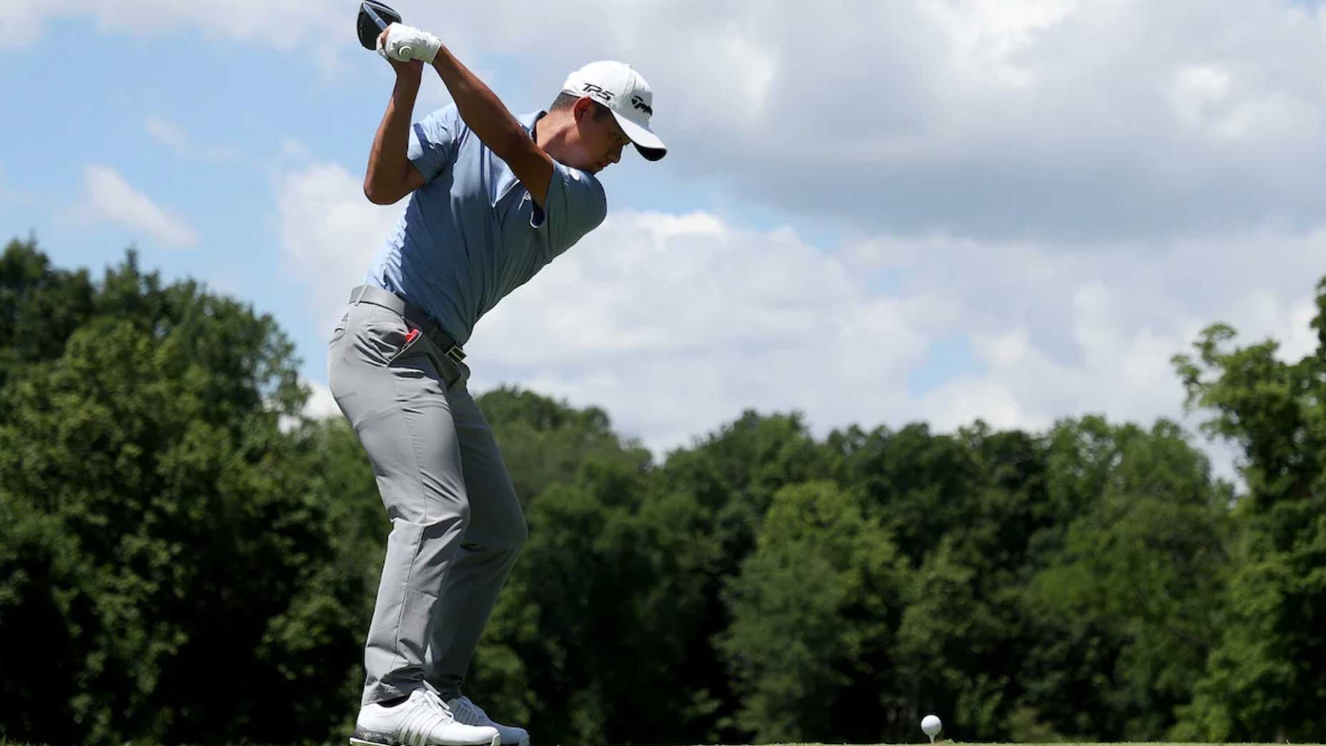 Collin Morikawa swings.