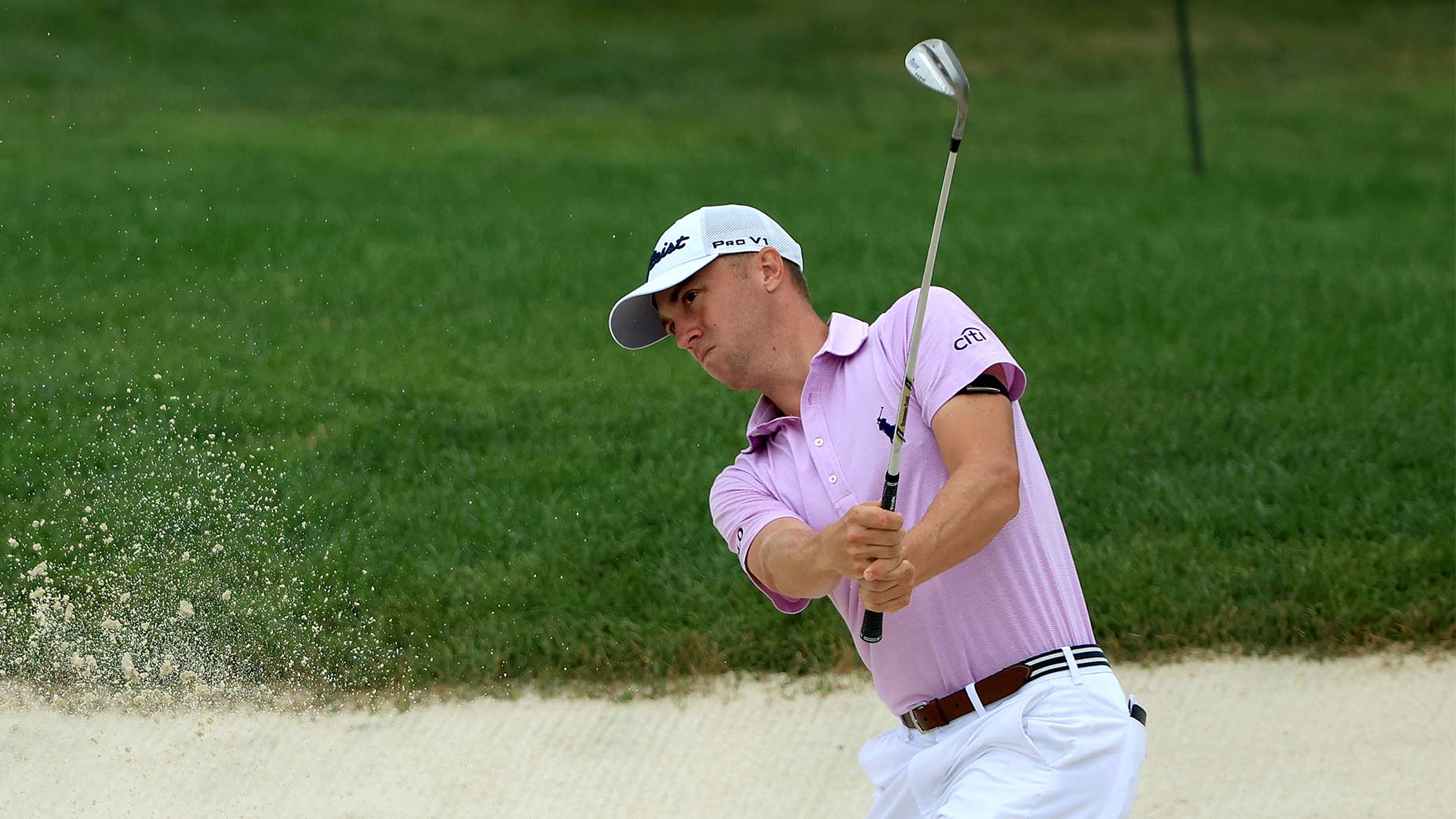 Justin Thomas hits out of the bunker