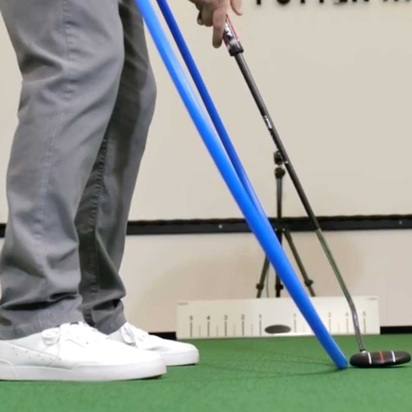 putting stroke with a hoola hoop