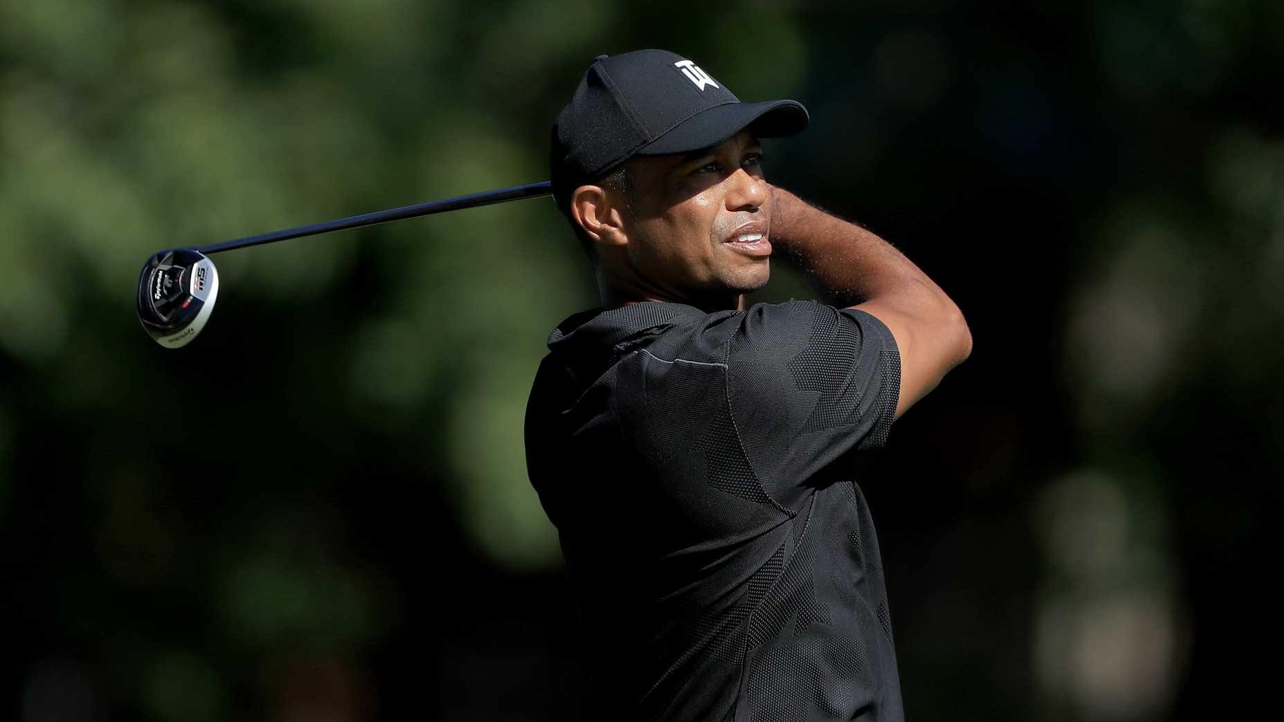Tiger Woods hits driver