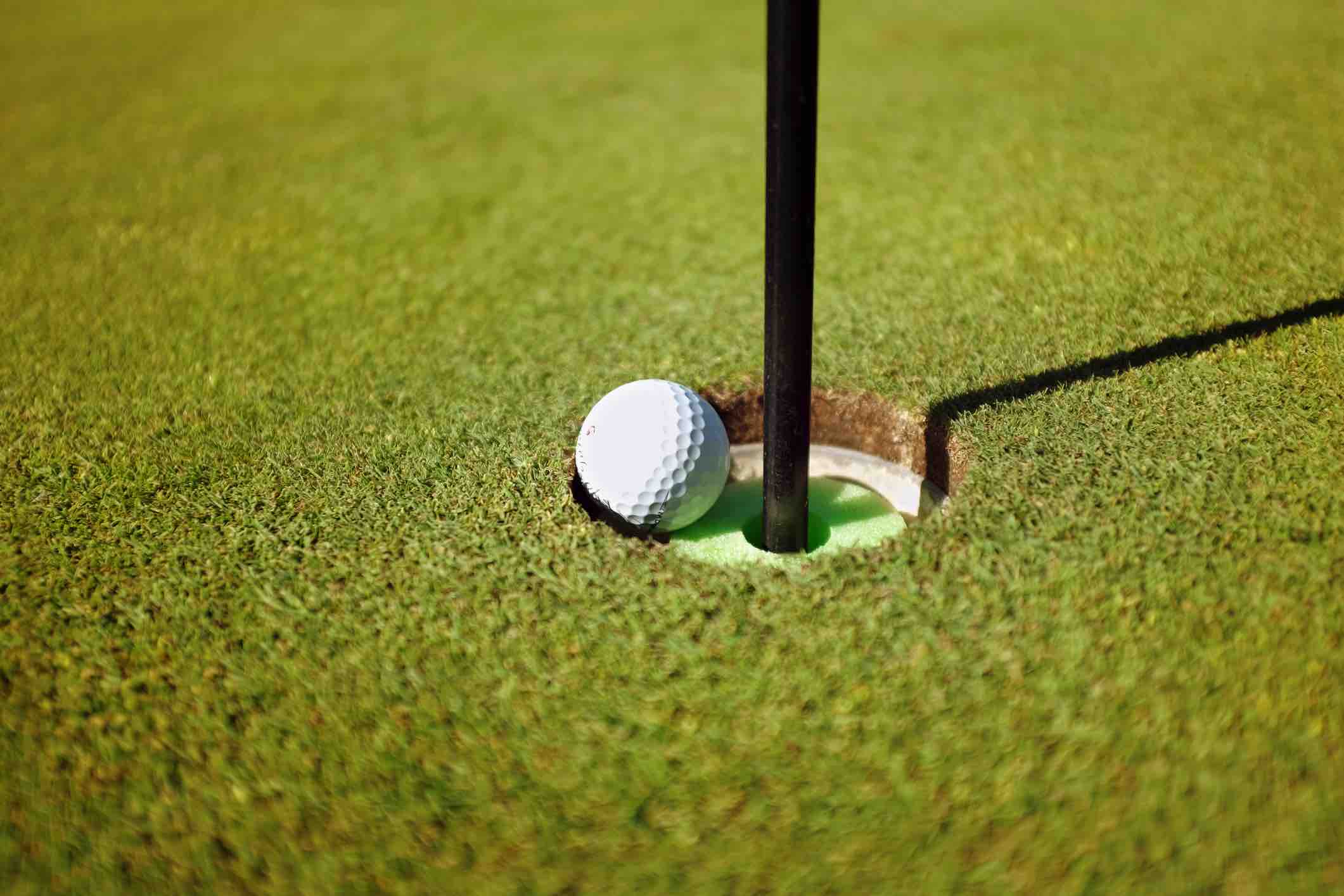 Is it a hole-in-one if a ball hits a modified hole and bounces out? Rules Guy