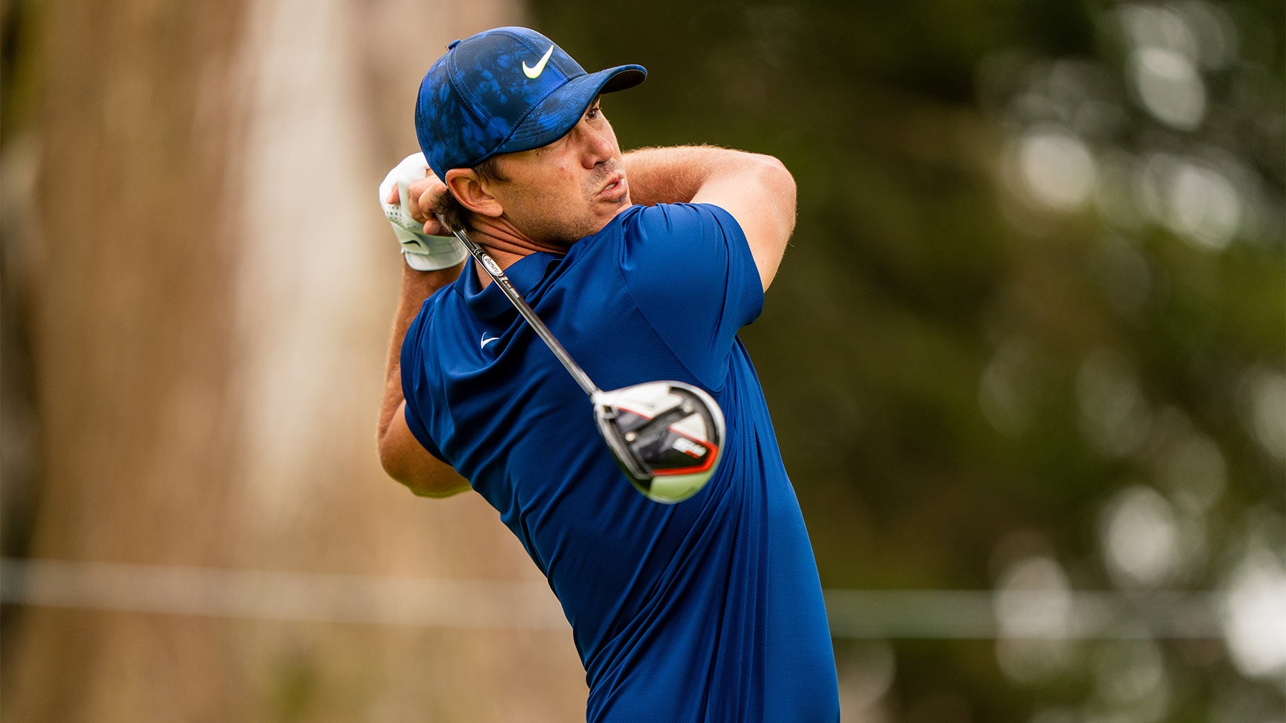 Brooks Koepka hits driver.
