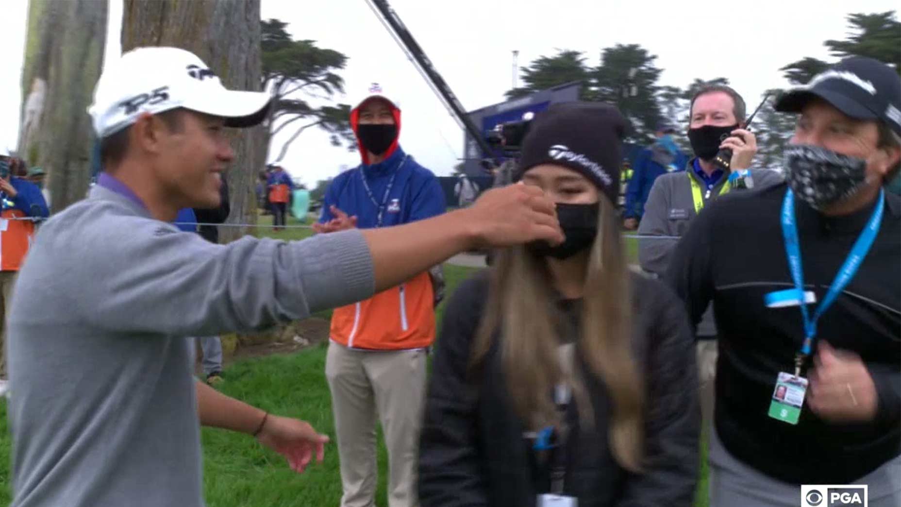 Collin Morikawa and his girlfriend.