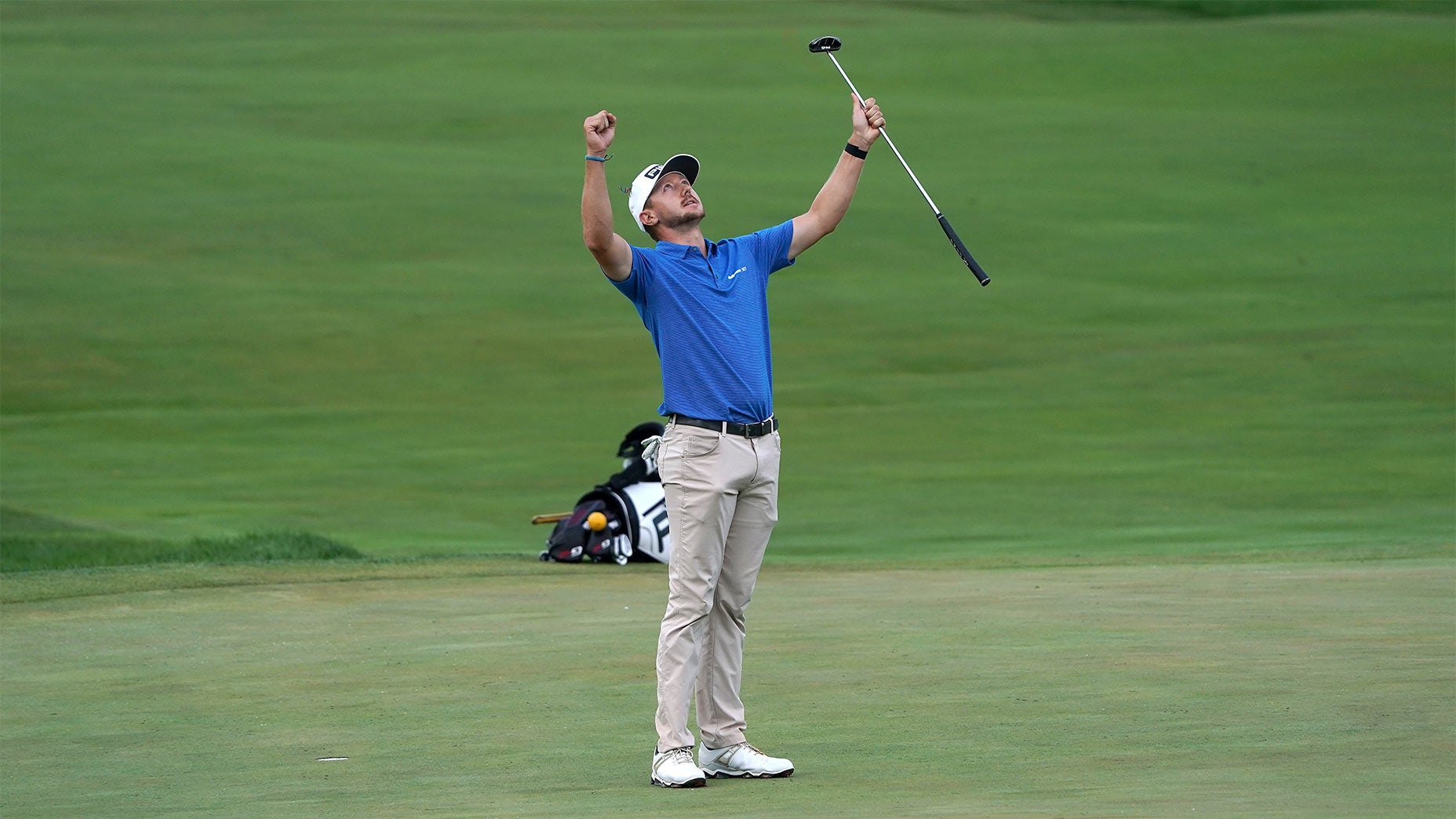 Mackenzie Hughes celebrates his par.