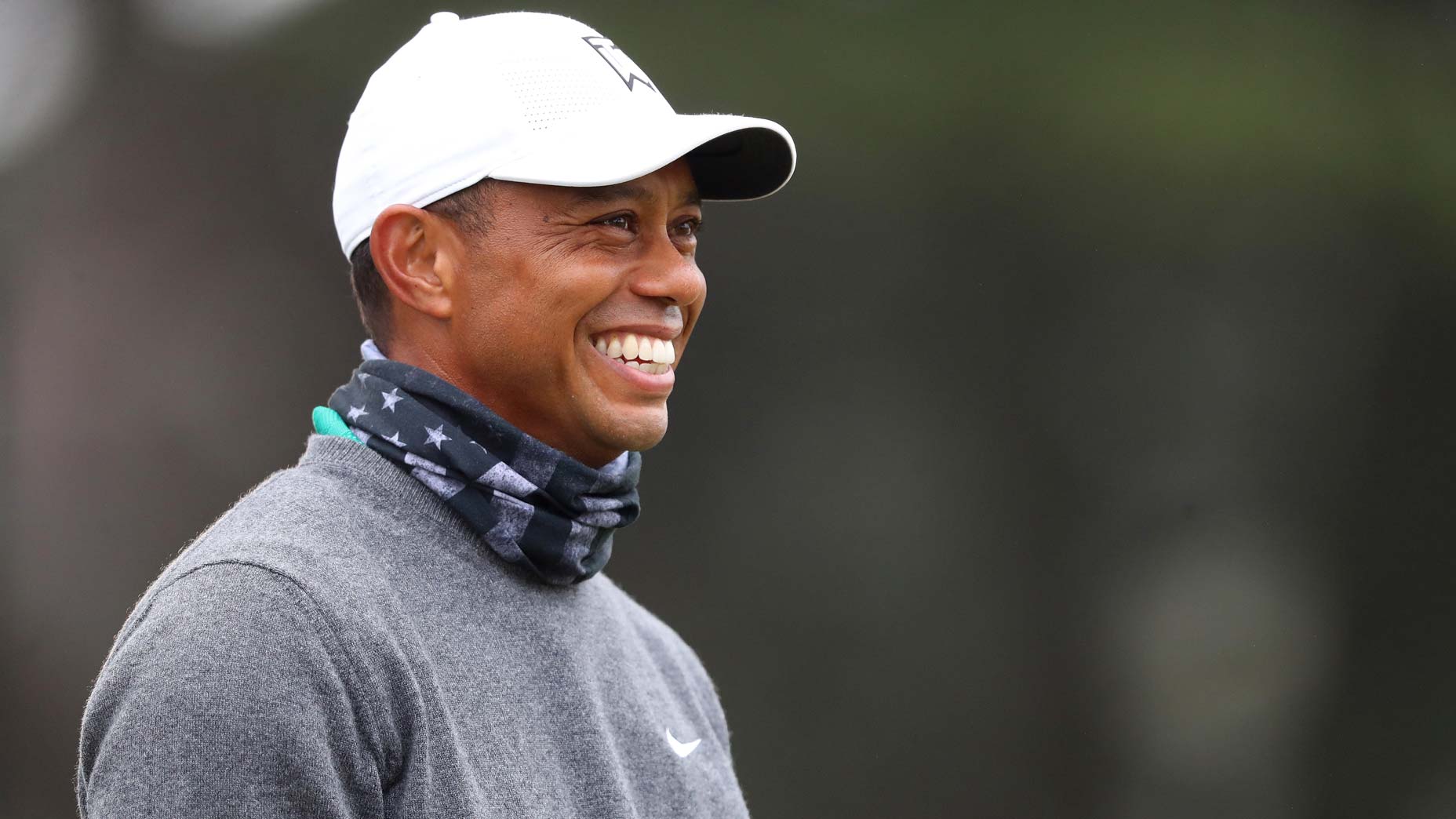 tiger woods smiles