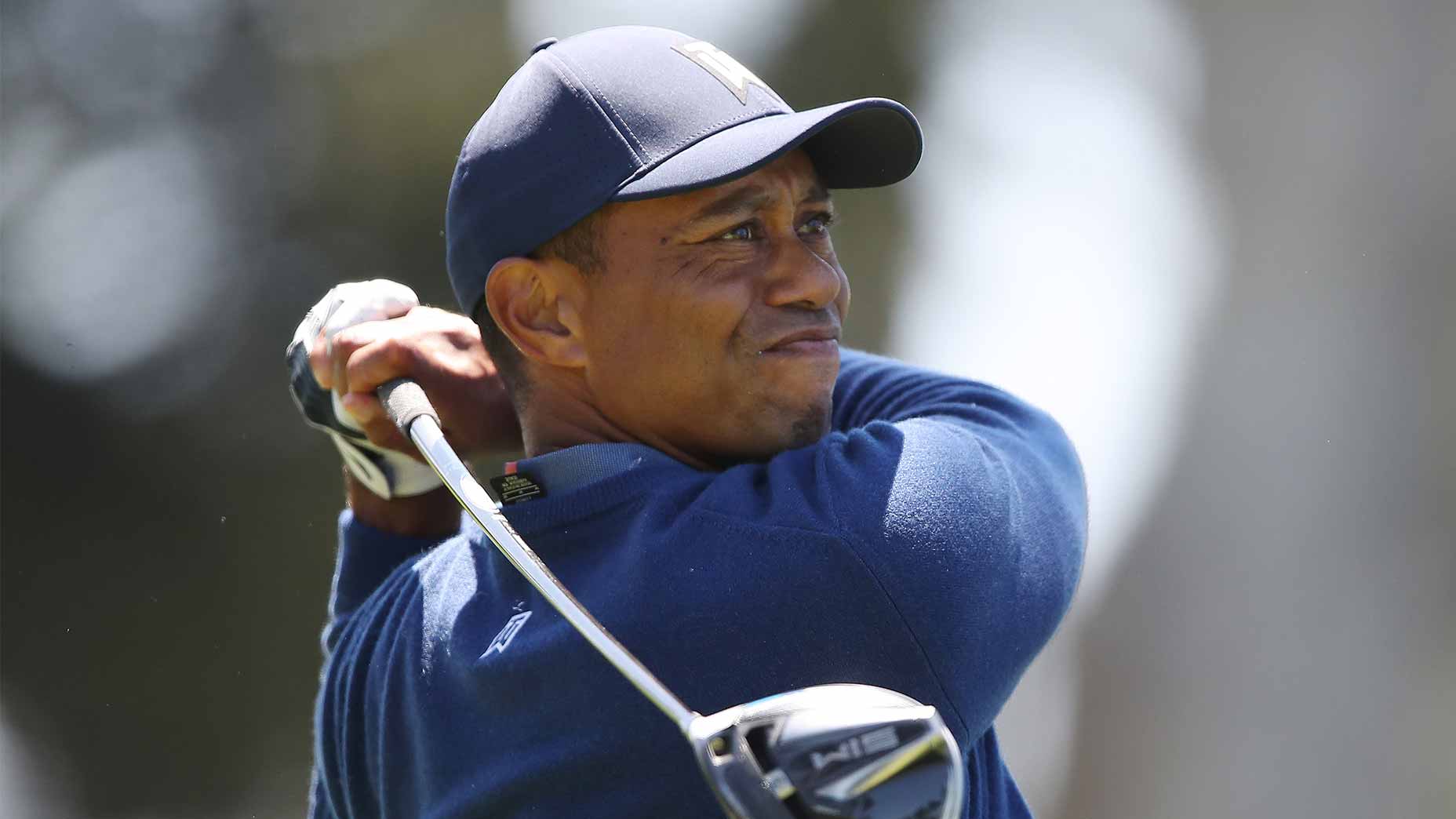 tiger woods swings club