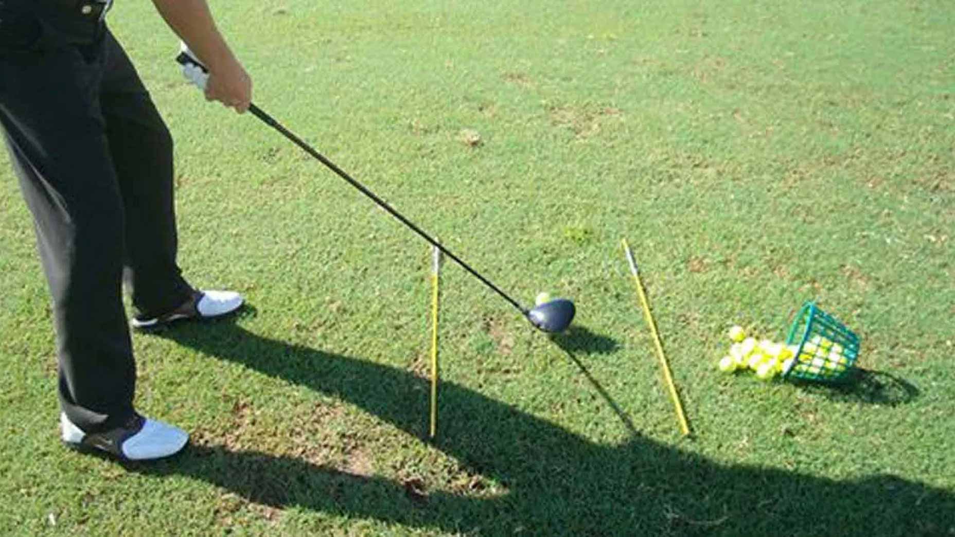 alignment sticks on range
