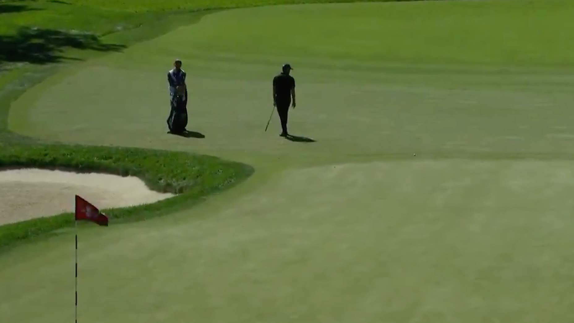 patrick cantlay walks after shot