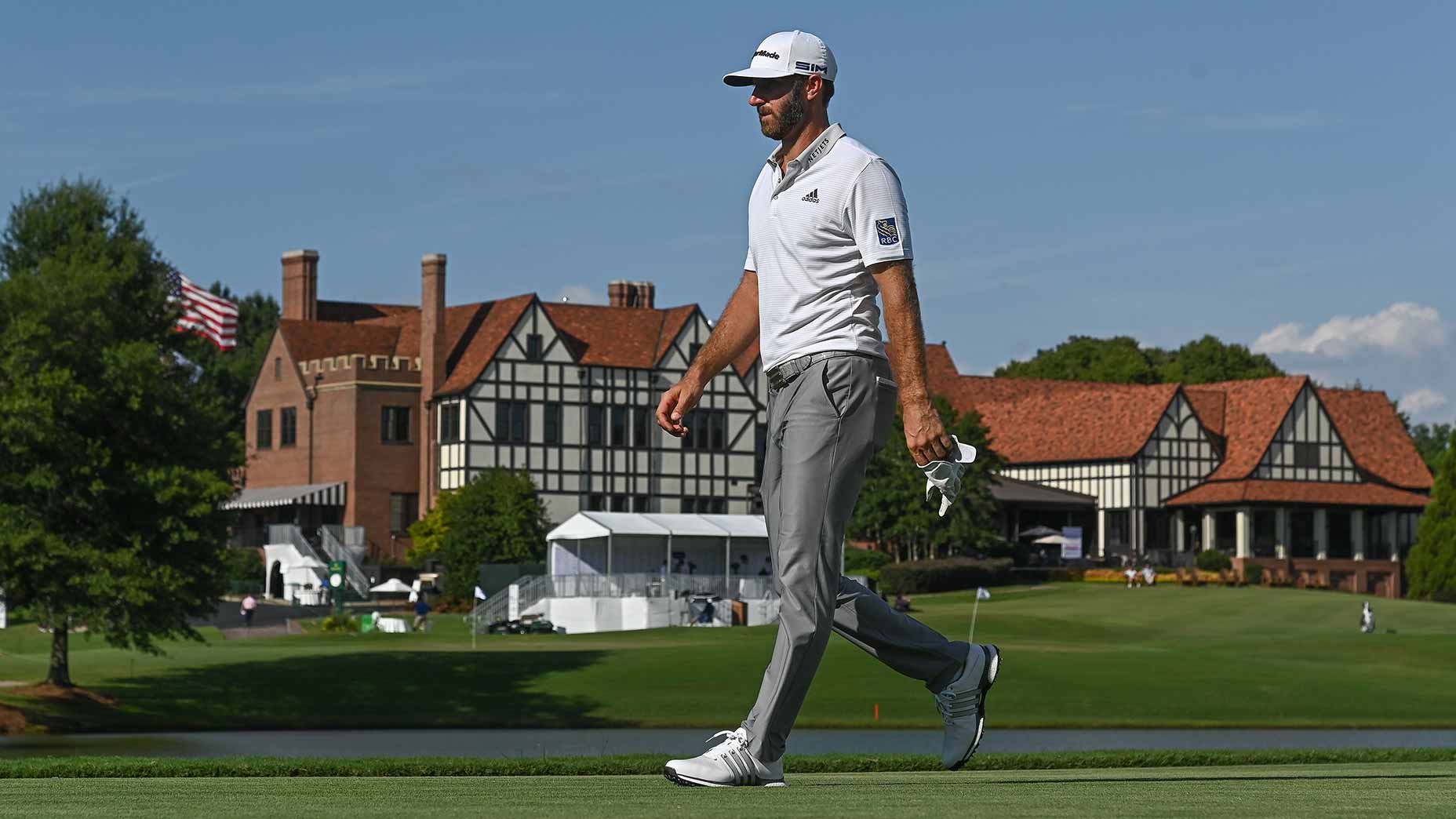 dustin johnson walks at east lake