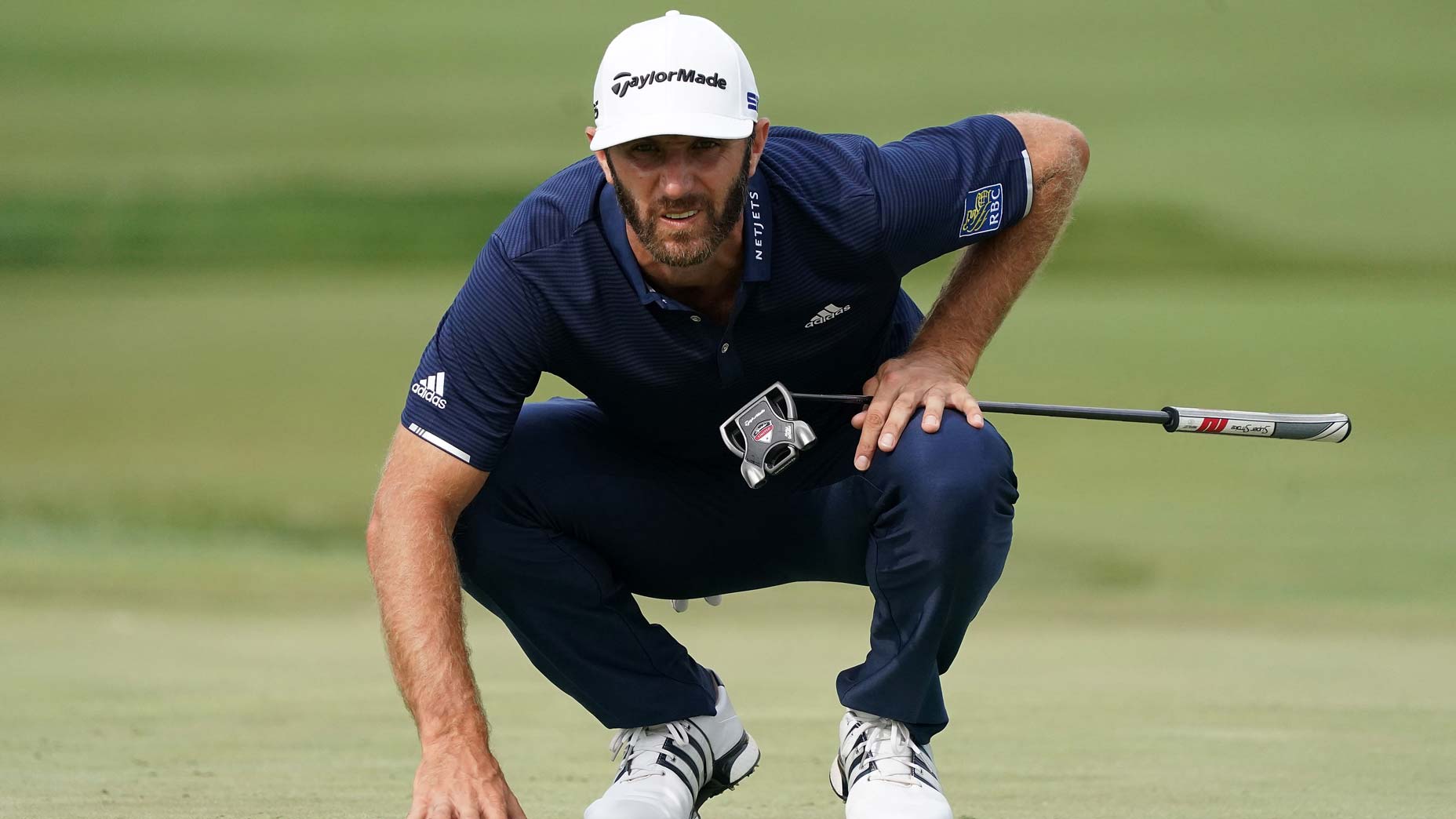 dustin johnson reads putt