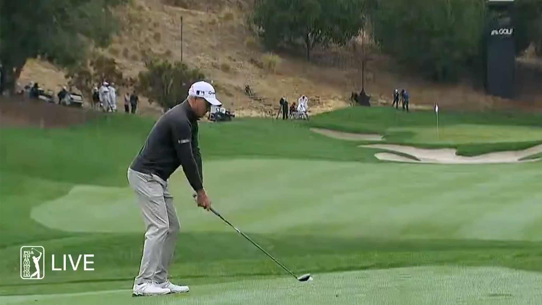 Adam Long hits a tee shot