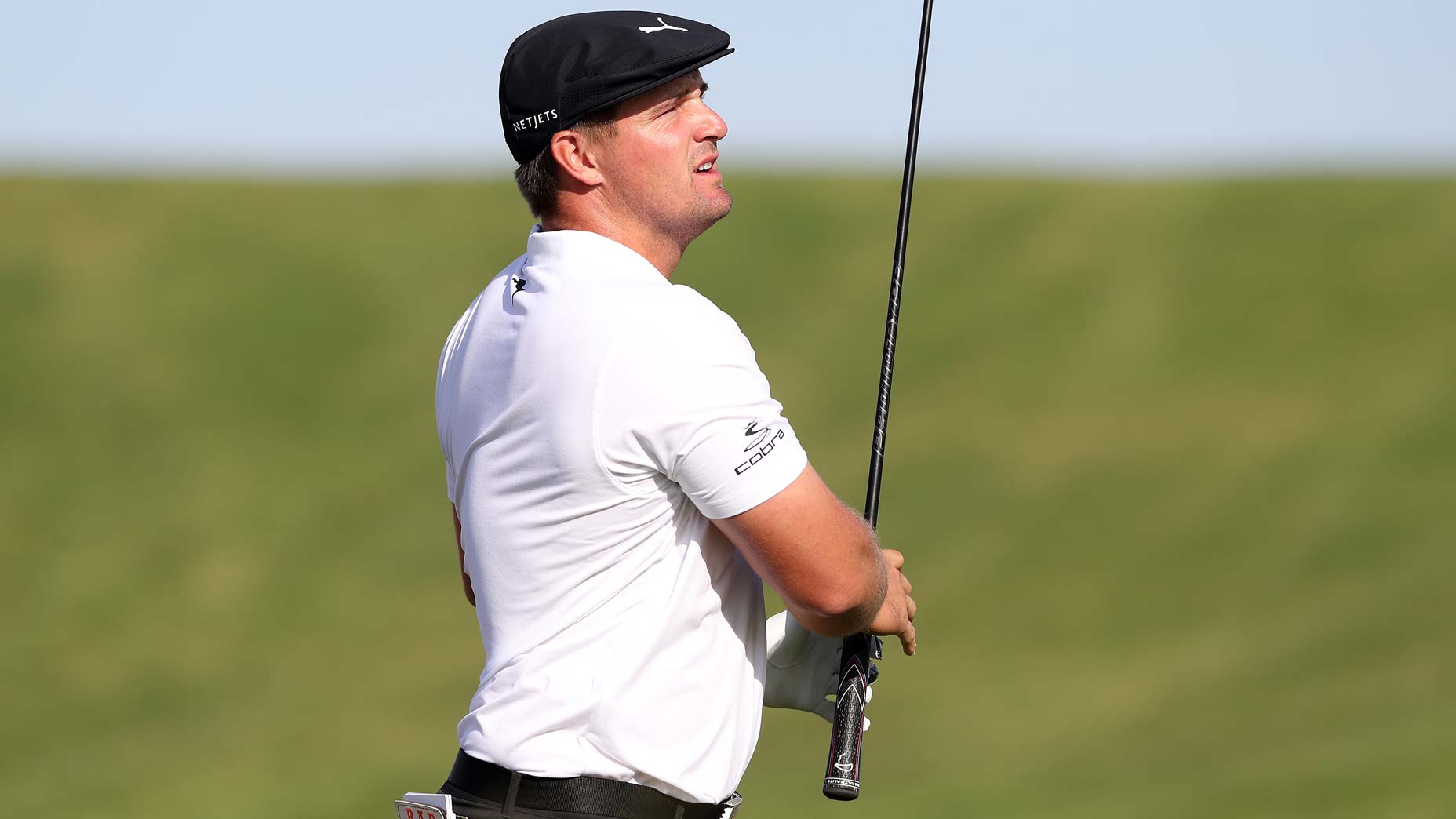 bryson dechambeau hits shot