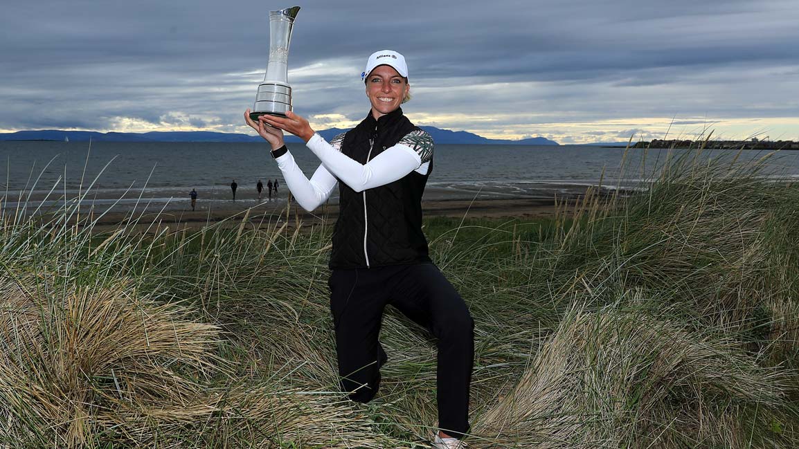 sophia popov holds trophy
